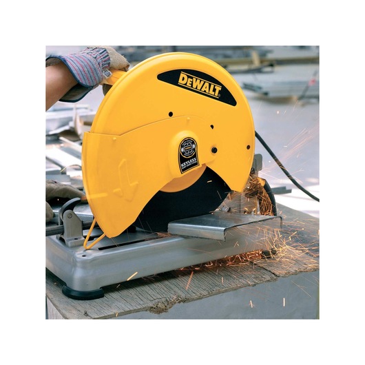 Chop Saw with QUIK-CHANGE™ Keyless Blade Change System being used to cut a piece of metal Chop Saw with QUIK-CHANGE™ Keyless Blade Change System being used to cut a piece of metal