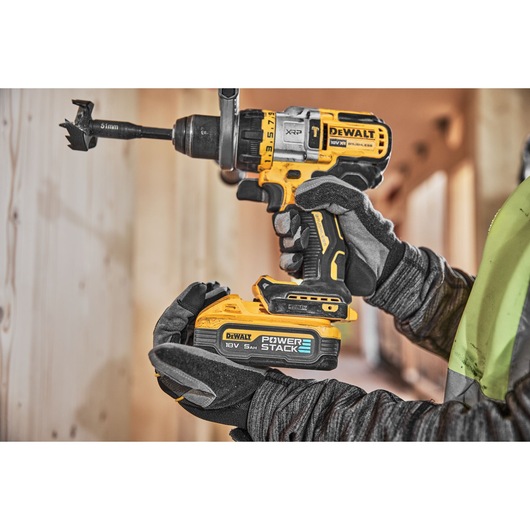 Powerstack battery being connected to a 18V XR Brushless drill driver
