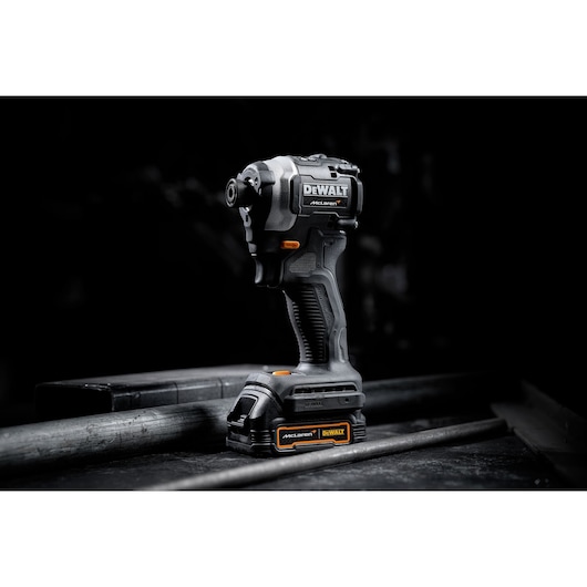 Limited Edition DEWALT/McLaren Impact Driver 3/4 right view in staged black background on black surface