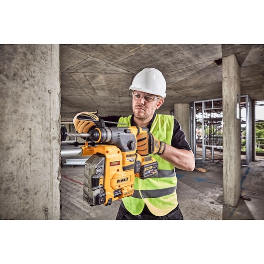 54V FlexVolt Brushless SDS Hammer Drill and Dust Extractor drilling concrete wall