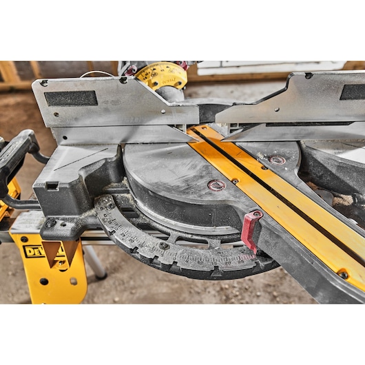 54v XR FLEXVOLT 305mm Mitre Saw close up of mitre adjustment 54v XR FLEXVOLT 305mm Mitre Saw close up of mitre adjustment
