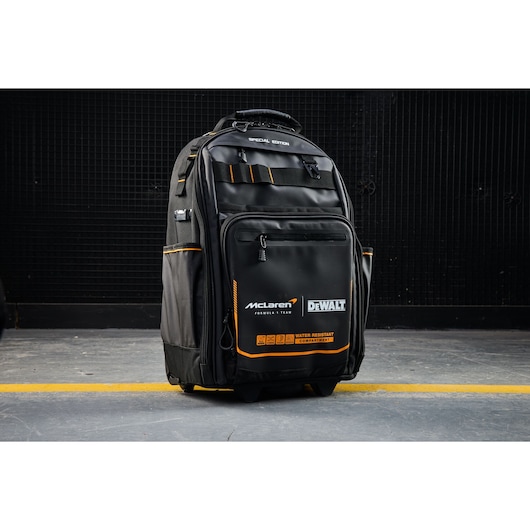 DEWALT McLaren backpack with multiple compartments, water resistance, for tool transport, durable storage.