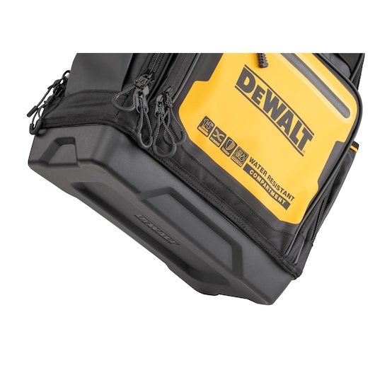 Close up of a mobile phone being slotted into external pocket on the Dewalt Pro Backpack