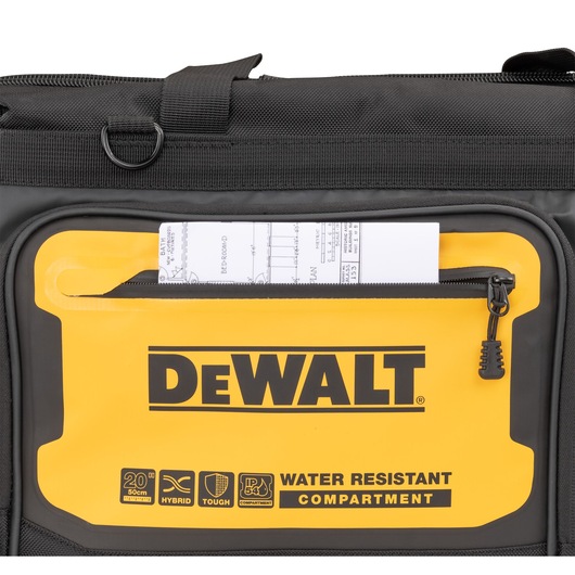 A set of plans is slotted into the water resistant compartment on the Dewalt 20" Pro Open Mouth Tool Bag" A set of plans is slotted into the water resistant compartment on the Dewalt 20" Pro Open Mouth Tool Bag"
