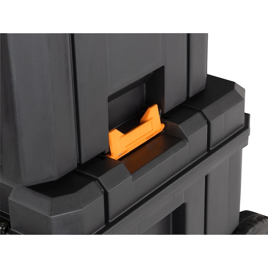 Black storage case with orange latch for equipment protection in photography use.