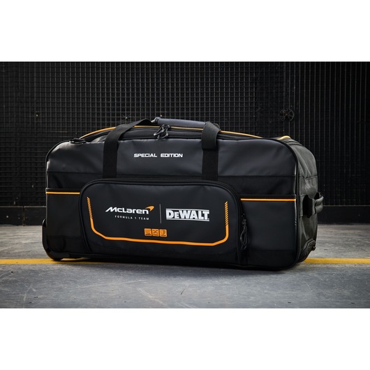 McLaren DEWALT special edition black sports bag with orange accents for tool or gear storage.